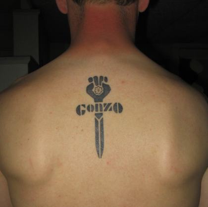 This is John's first and only tattoo, which he had done back in March
